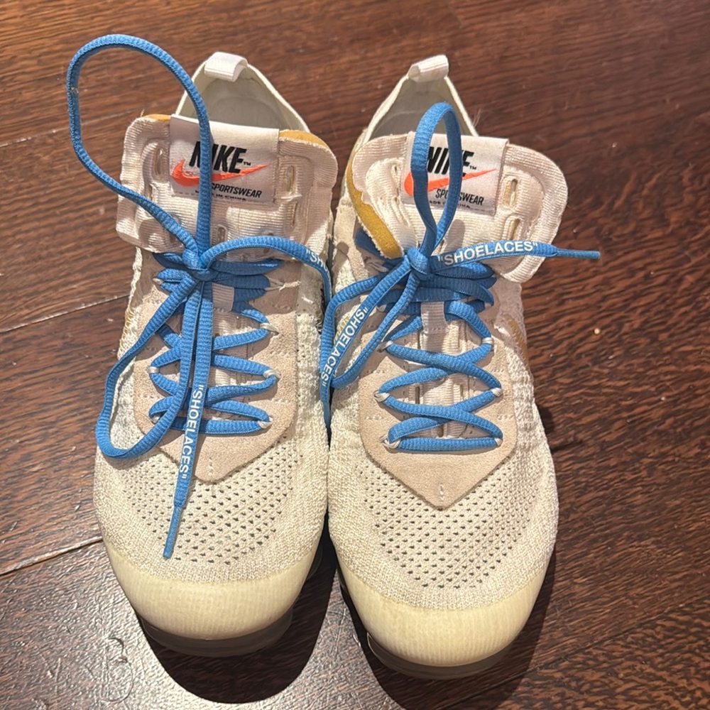 Nike Tan Sneakers with Blue Accents